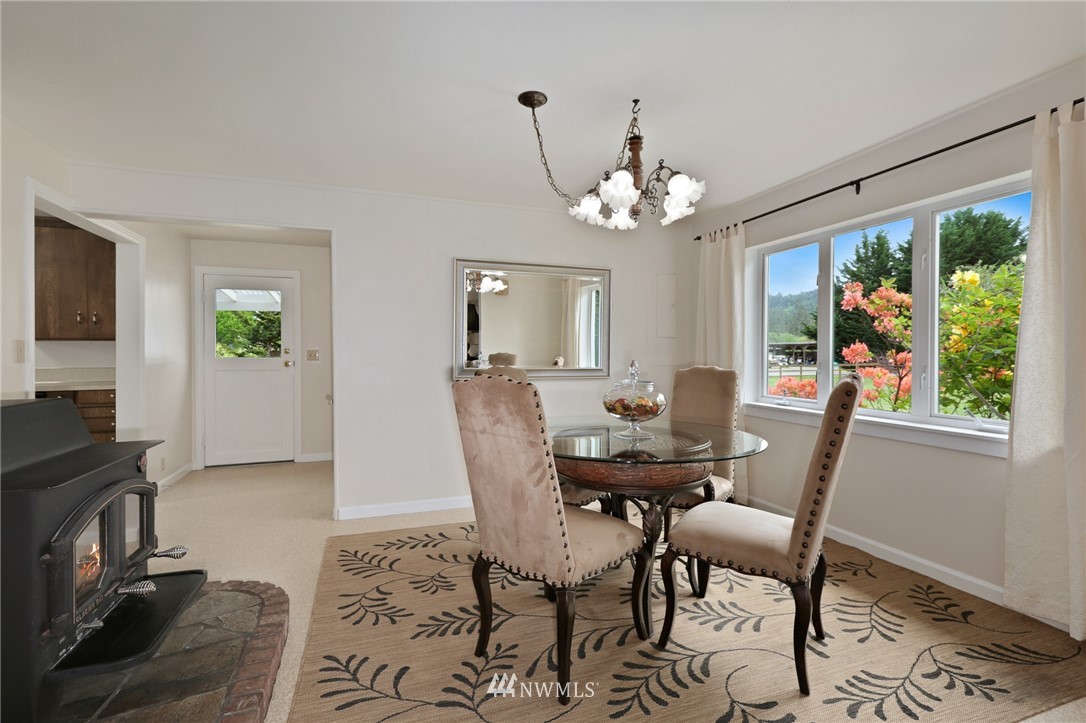 4440 Preston-Fall City Road Southeast Fall City, WA 98024 - Photo 7 of 38 a view of a dining room with furniture window and outside view