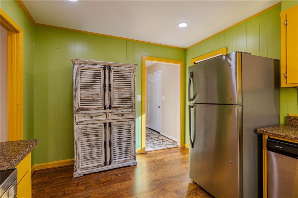4 Colonial Drive Rome, GA 30165 - Photo 12 of 31 a metallic refrigerator freezer sitting in a kitchen