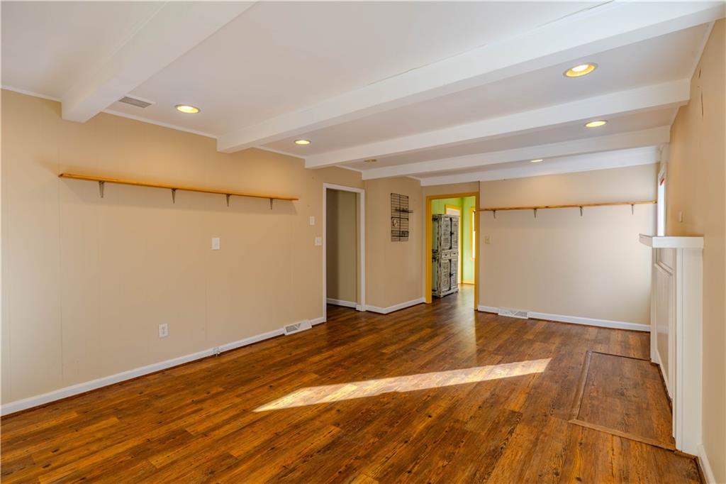 4 Colonial Drive Rome, GA 30165 - Photo 14 of 31 a view of an empty room with wooden floor and a window