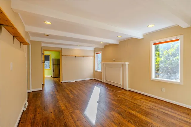 a view of an empty room and window