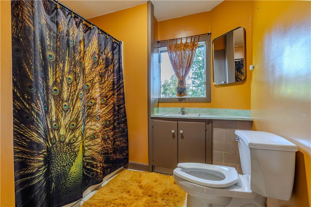 4 Colonial Drive Rome, GA 30165 - Photo 24 of 31 a bathroom with a toilet and a sink