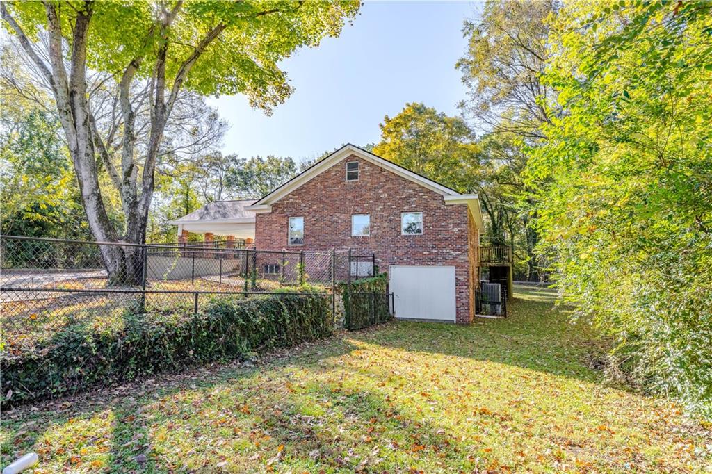 4 Colonial Drive Rome, GA 30165 - Photo 30 of 31 a front view of a house with a yard