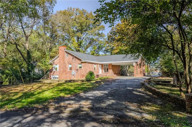 a house with a tree in front of it