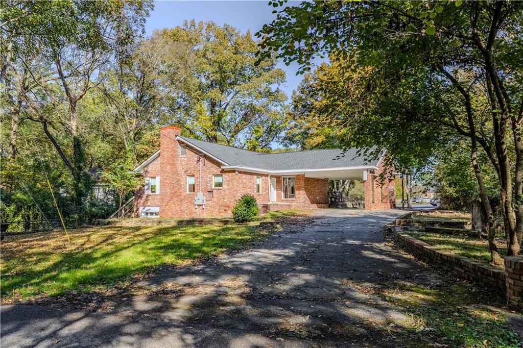 4 Colonial Drive Rome, GA 30165 - Photo 31 of 31 a house with a tree in front of it