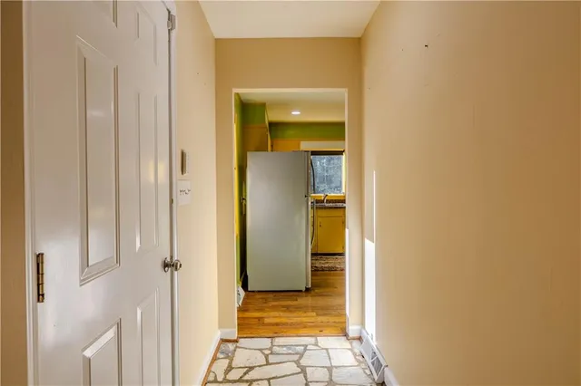 a view of a bathroom with a glass door
