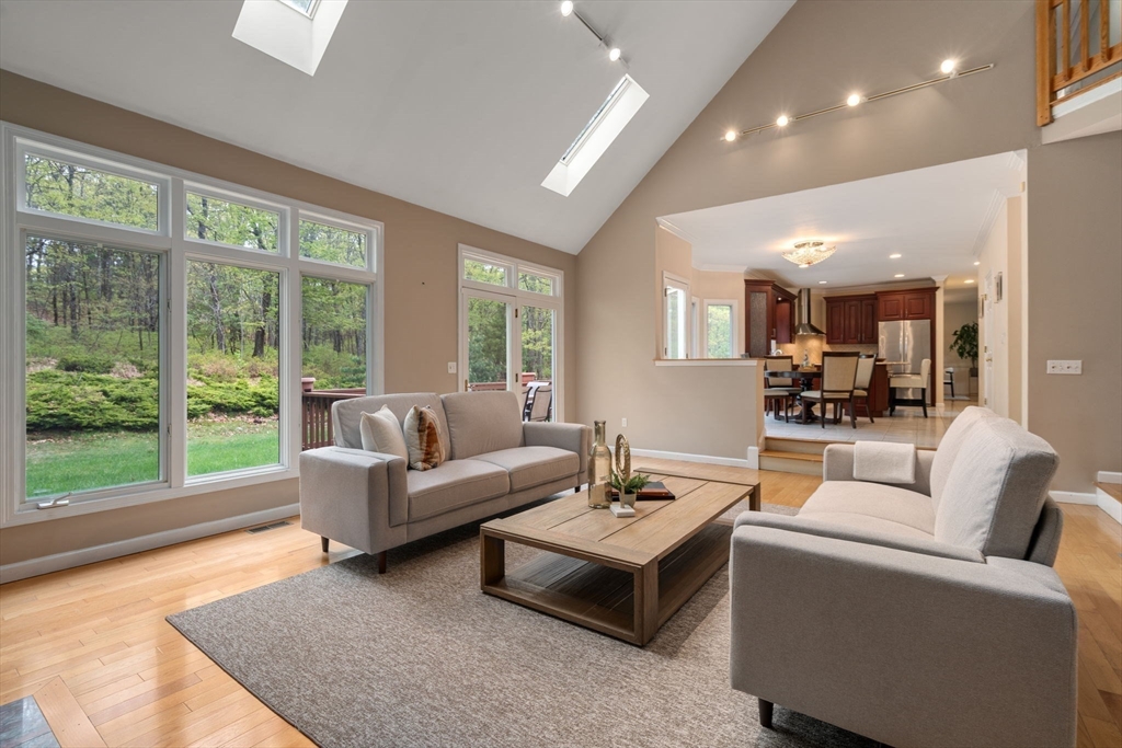 11 Black Elk Road Sharon, MA 02067 - Photo 12 of 28 a living room with furniture and a large window