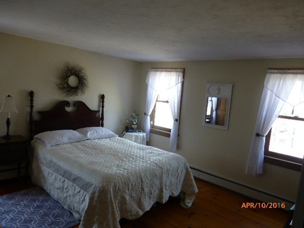 1 Cuba Road Worcester, MA 01603 - Photo 11 of 15 a bedroom with a bed and window