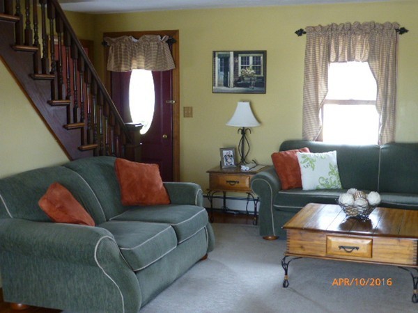 1 Cuba Road Worcester, MA 01603 - Photo 2 of 15 a living room with furniture and a mirror