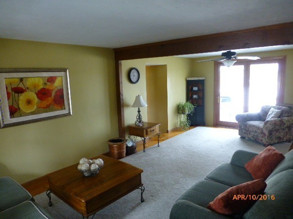 1 Cuba Road Worcester, MA 01603 - Photo 3 of 15 a living room with furniture and a potted plant