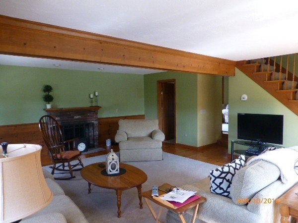 1 Cuba Road Worcester, MA 01603 - Photo 5 of 15 a living room with furniture and a flat screen tv