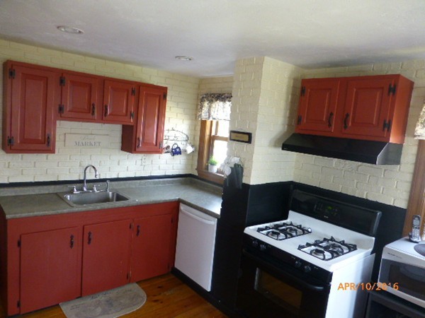 1 Cuba Road Worcester, MA 01603 - Photo 8 of 15 a kitchen with a cabinets and stove