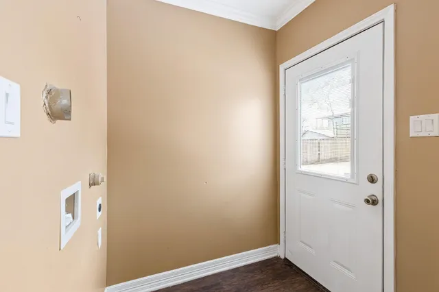 a kitchen with stainless steel appliances a refrigerator sink and cabinets
