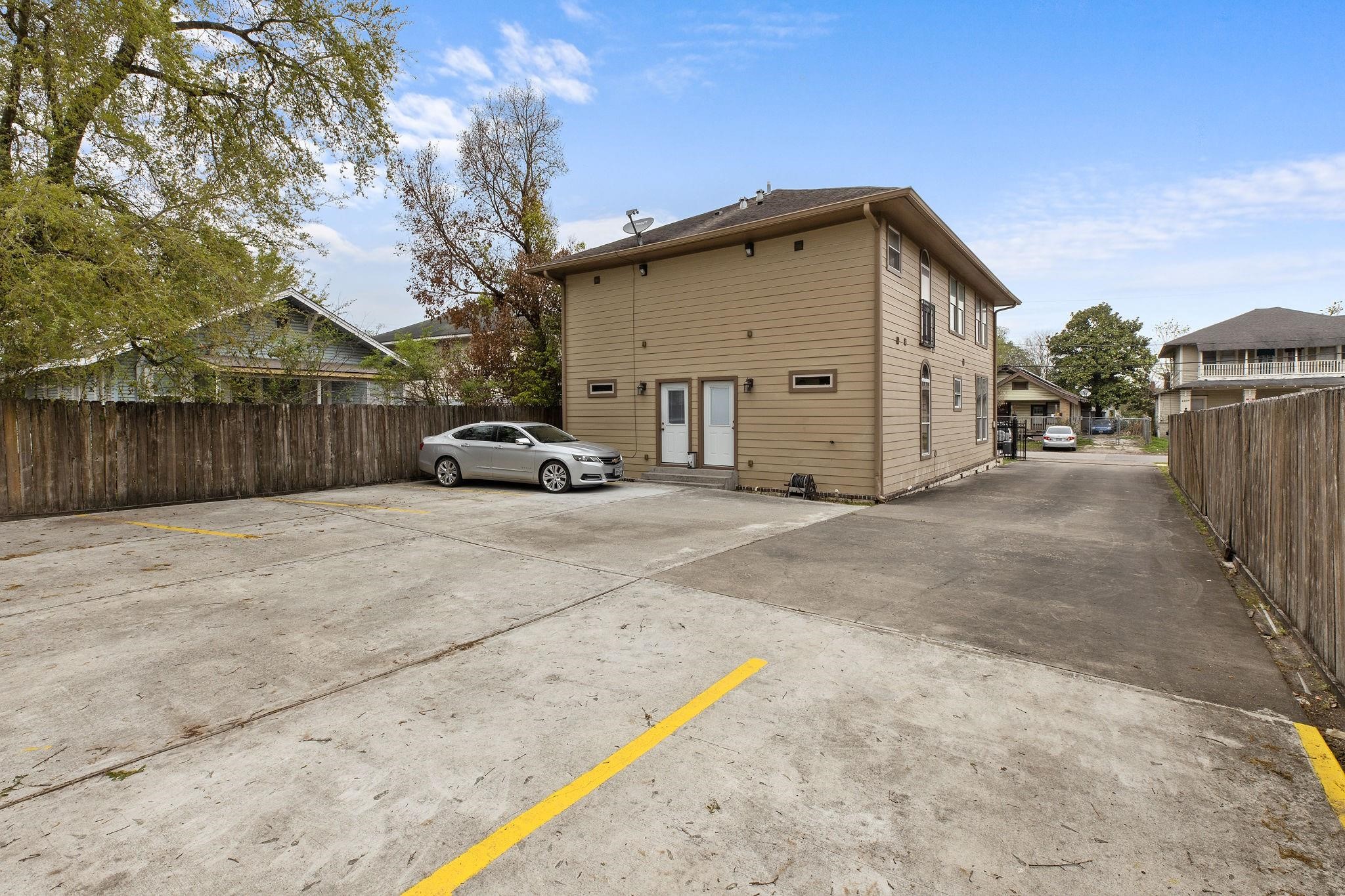 4306 Wilmer Street, Unit 2 Houston, TX 77003 - Photo 5 of 17 a view of a car park in front of house