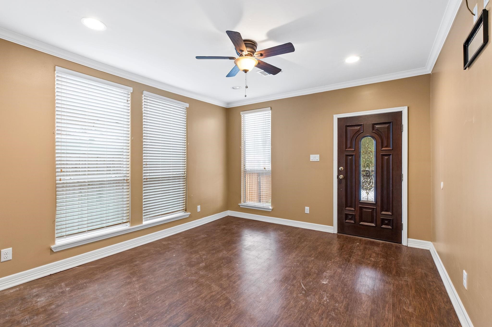 4306 Wilmer Street, Unit 2 Houston, TX 77003 - Photo 10 of 17 wooden floor in an empty room with a window
