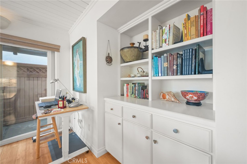 34041 El Contento Dana Point, CA 92629 - Photo 11 of 22 a room with cabinets and book shelf