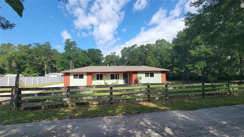 122 North Cedarview Terrace Inverness, FL 34453 - Photo 1 of 1 a front view of a house with a yard
