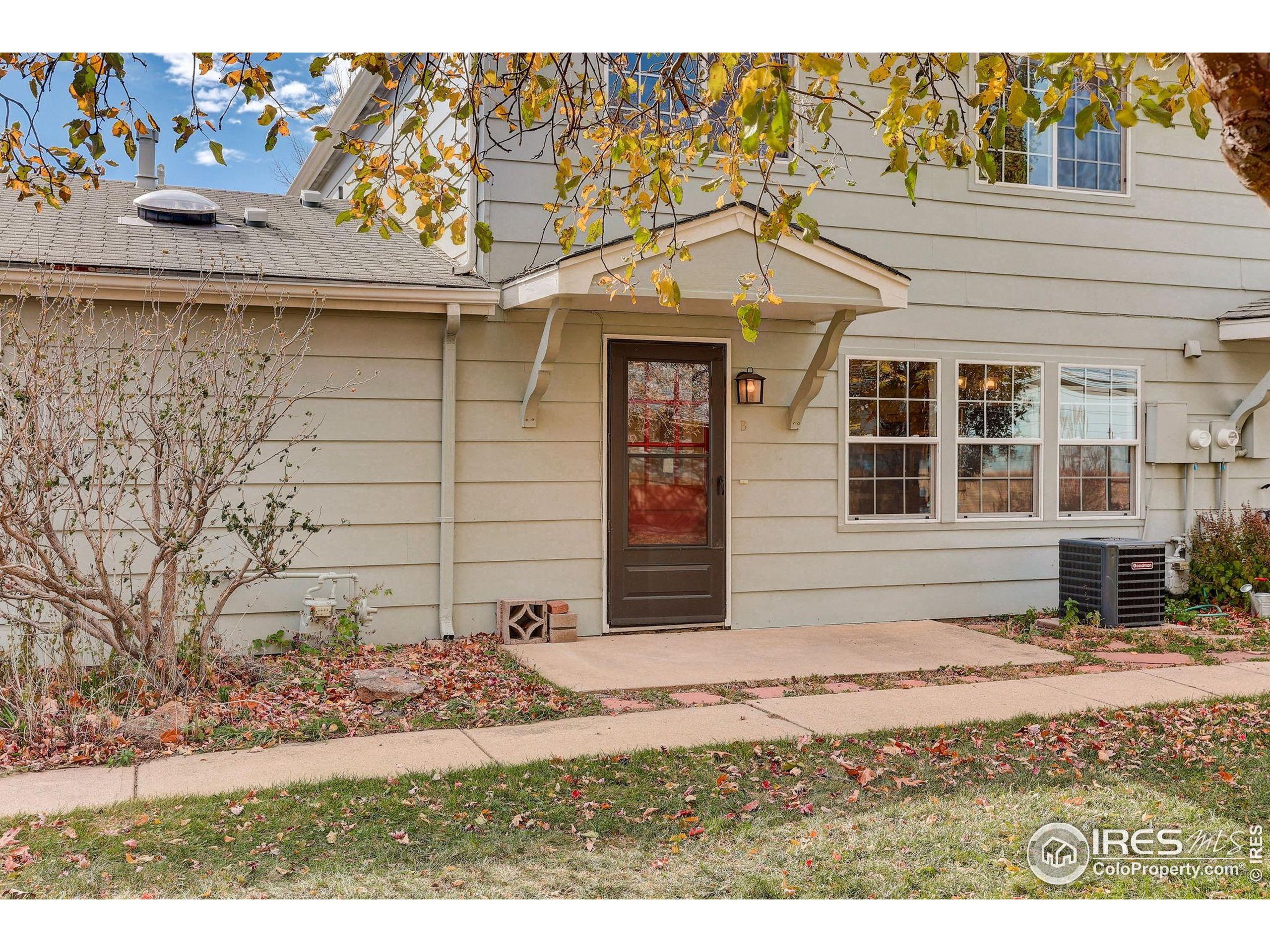 3360 34th Street, Unit B Boulder, CO 80301 - Photo 19 of 22 a front view of a house with garden