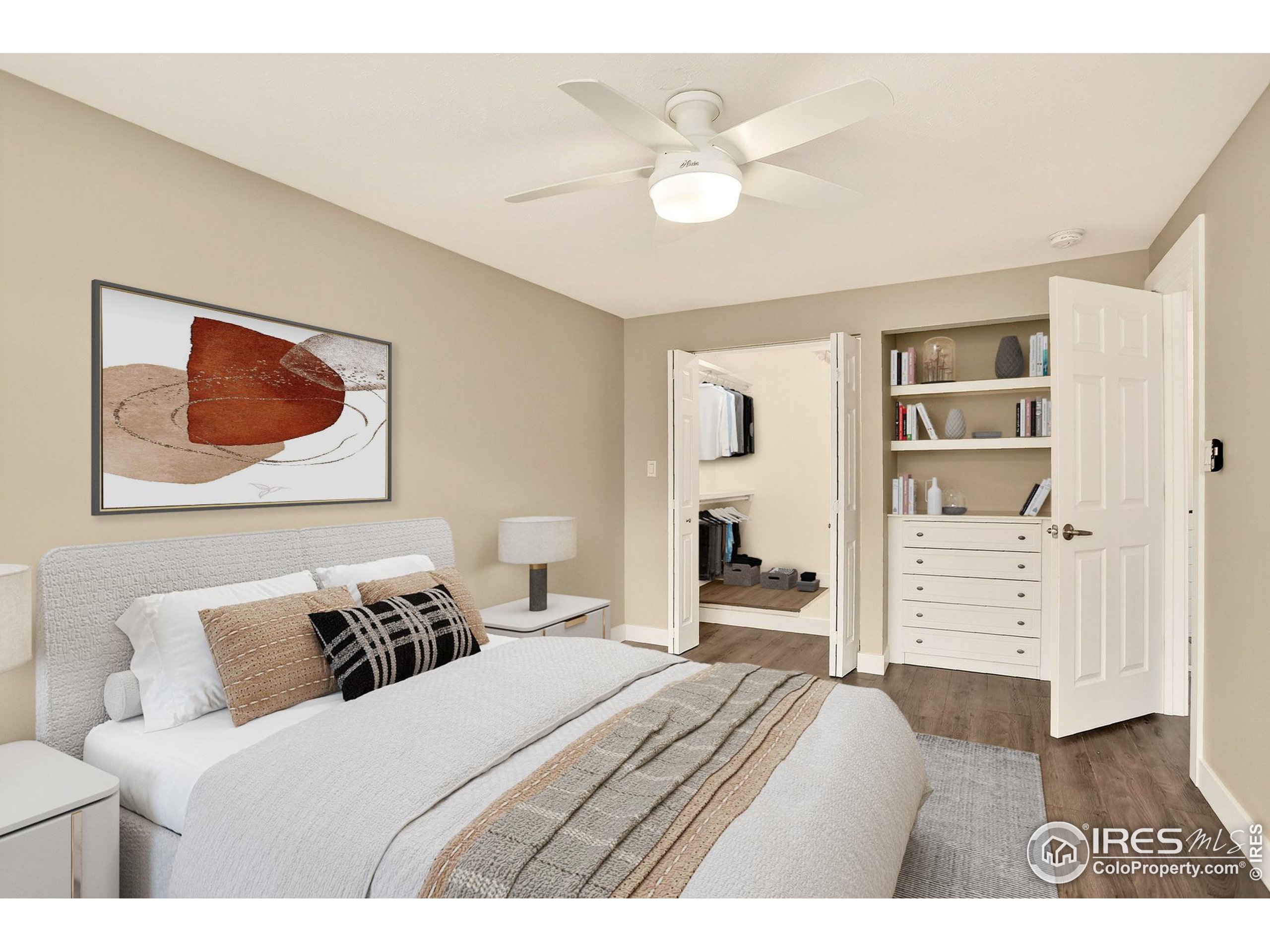 3360 34th Street, Unit B Boulder, CO 80301 - Photo 10 of 22 a bedroom with a bed and a painting on the wall