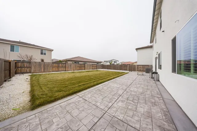 a swimming pool view with a outdoor space