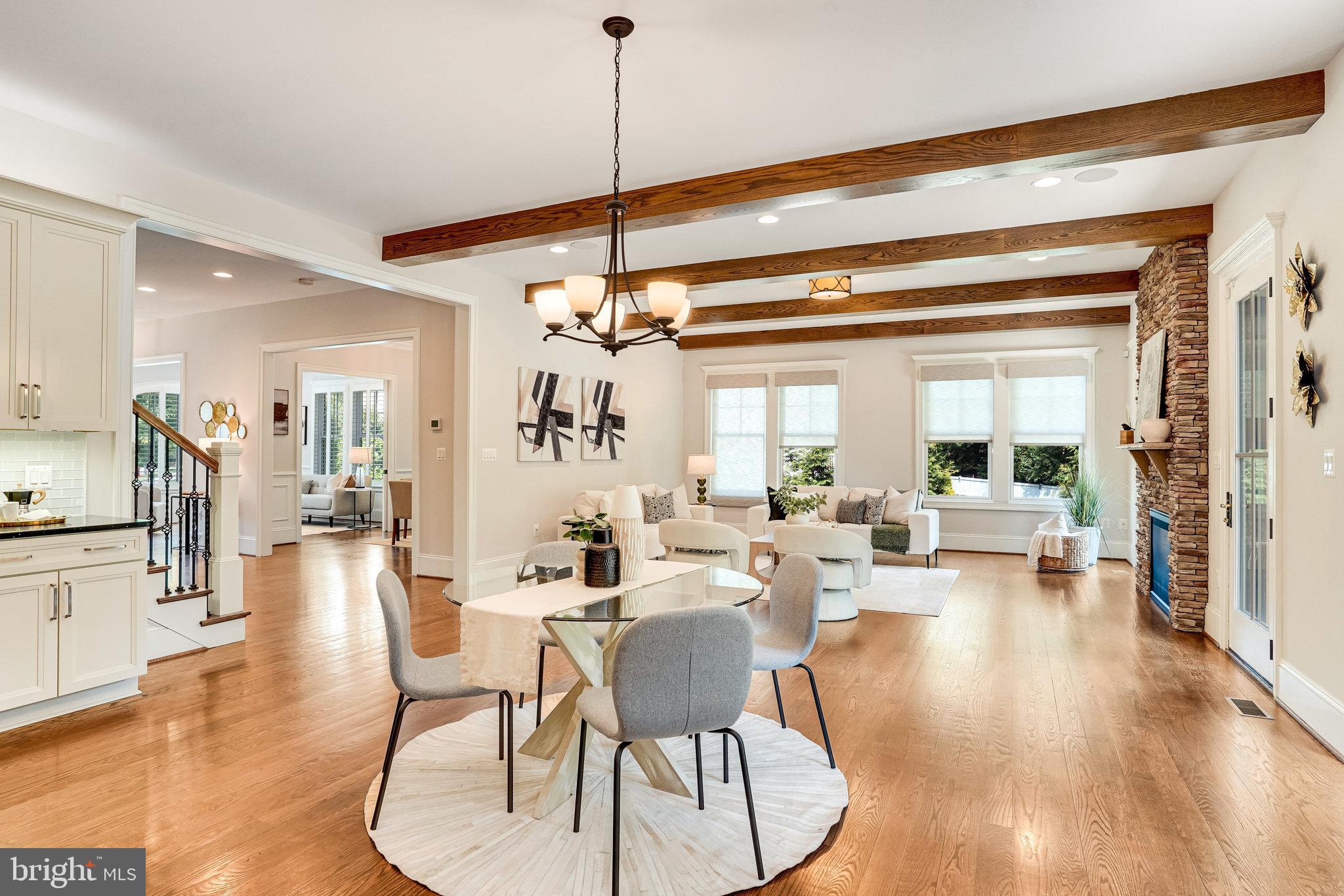 920 Ninovan Road Southeast Vienna, VA 22180 - Photo 16 of 44 a view of a dining room and livingroom with furniture wooden floor a chandelier
