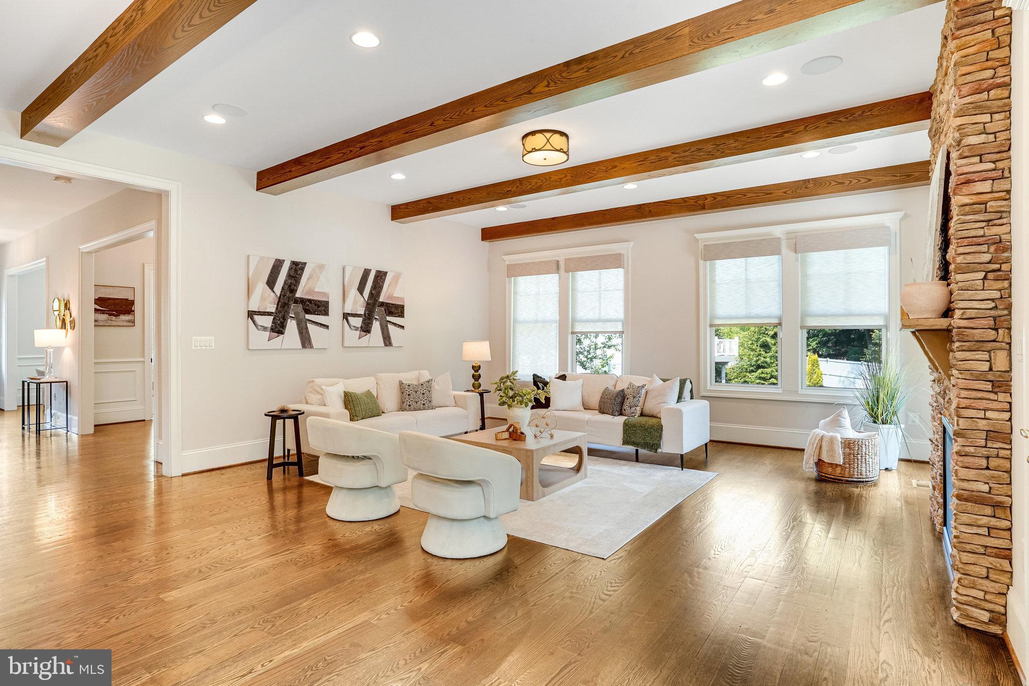 920 Ninovan Road Southeast Vienna, VA 22180 - Photo 17 of 44 a living room with fireplace furniture and a wooden floor