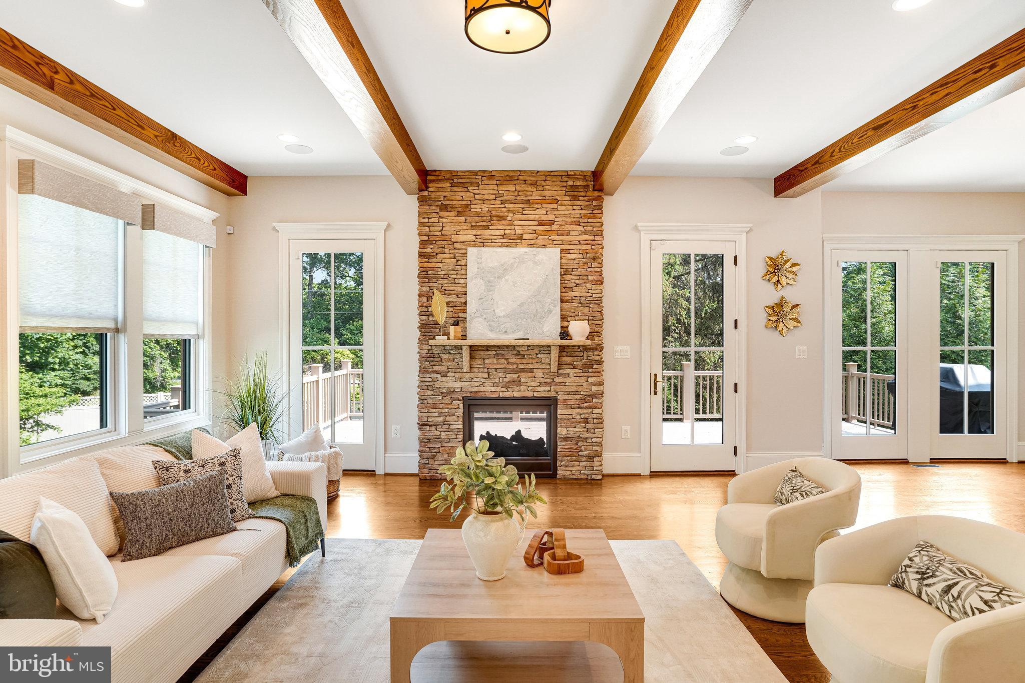 920 Ninovan Road Southeast Vienna, VA 22180 - Photo 19 of 44 a living room with furniture large window and wooden floor