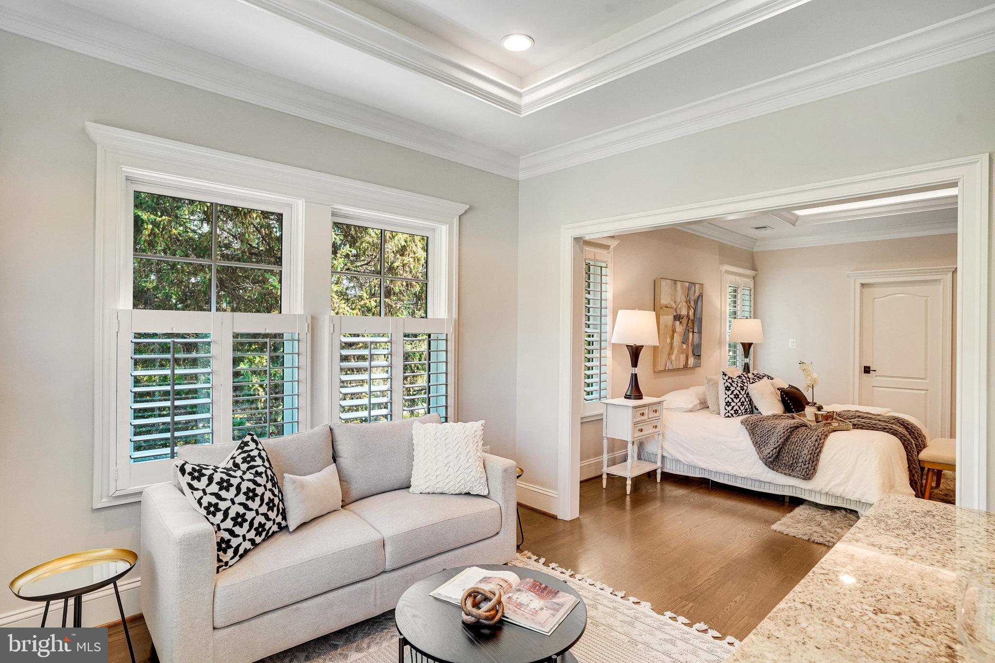 920 Ninovan Road Southeast Vienna, VA 22180 - Photo 24 of 44 a living room with furniture and floor to ceiling windows