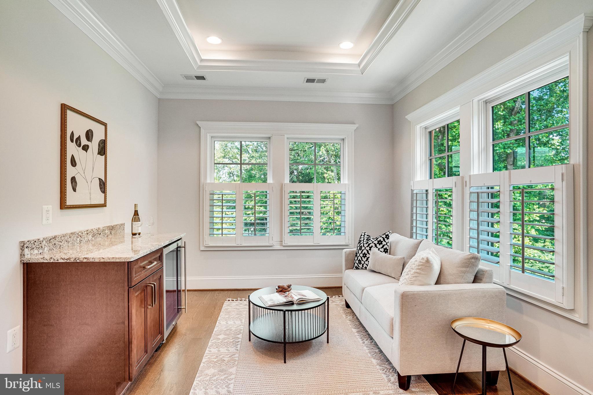 920 Ninovan Road Southeast Vienna, VA 22180 - Photo 25 of 44 a living room with furniture and a large window