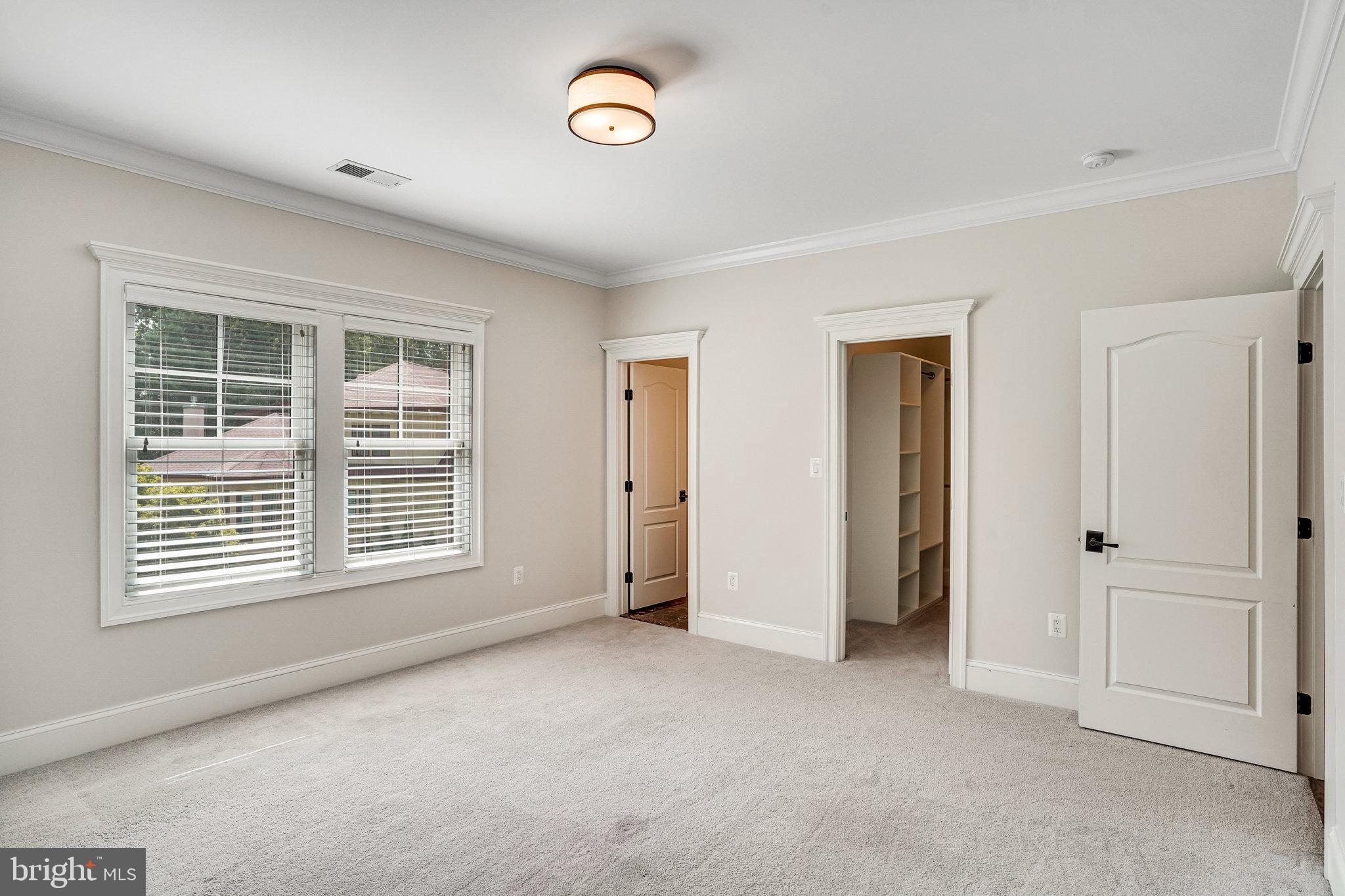 920 Ninovan Road Southeast Vienna, VA 22180 - Photo 35 of 44 an empty room with windows