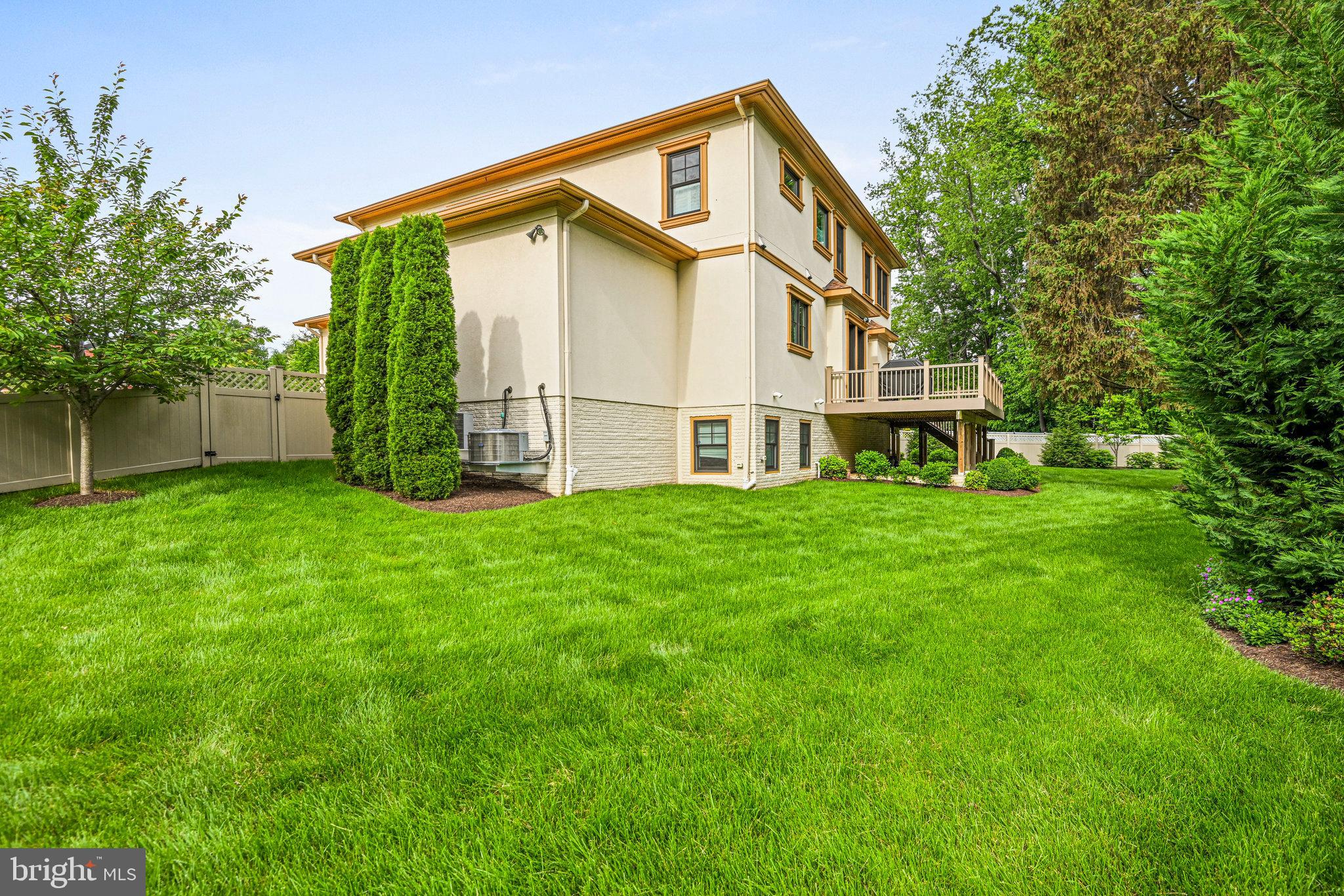 920 Ninovan Road Southeast Vienna, VA 22180 - Photo 41 of 44 a view of an house with backyard space and garden