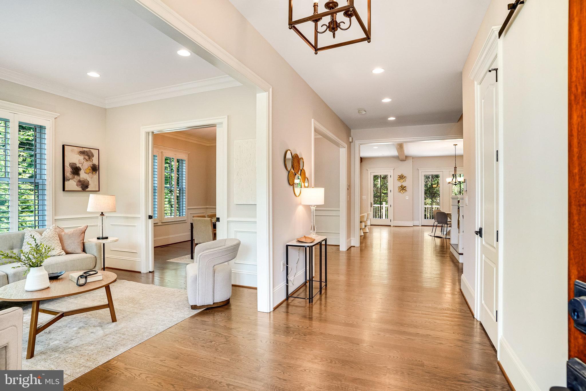 920 Ninovan Road Southeast Vienna, VA 22180 - Photo 6 of 44 a living room with furniture and a wooden floor