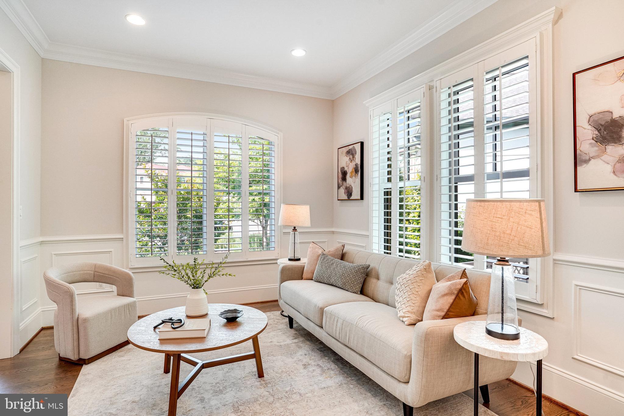 920 Ninovan Road Southeast Vienna, VA 22180 - Photo 7 of 44 a living room with furniture and a large window