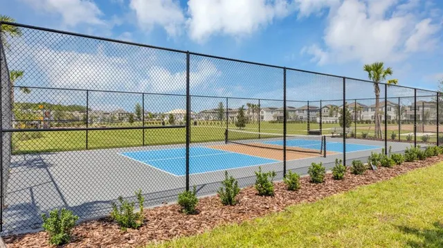 an aerial view of a tennis court