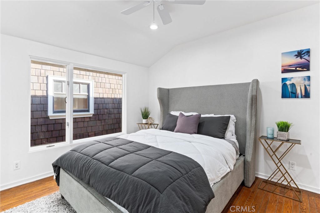 2804 West Oceanfront Newport Beach, CA 92663 - Photo 10 of 16 a bedroom with a bed and window