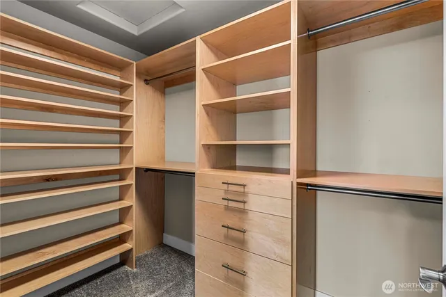 a view of outdoor space with playground and green space