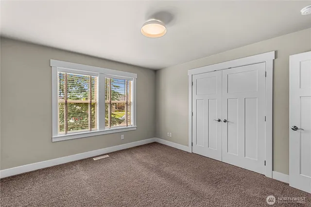 a view of outdoor space with playground and green space