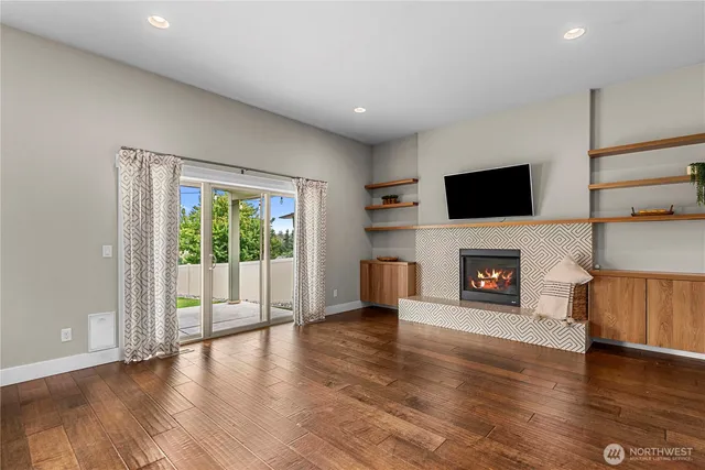 a large kitchen with cabinets and stainless steel appliances