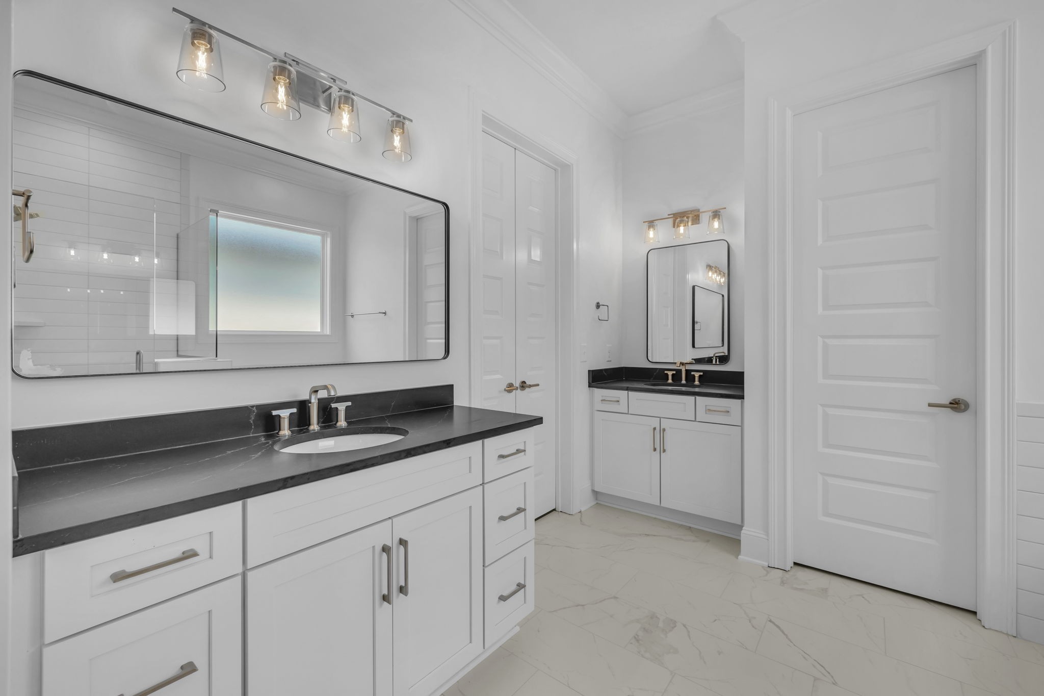 2018 Nathaniel Road Franklin, TN 37064 - Photo 23 of 52 a bathroom with a double vanity sink and mirror