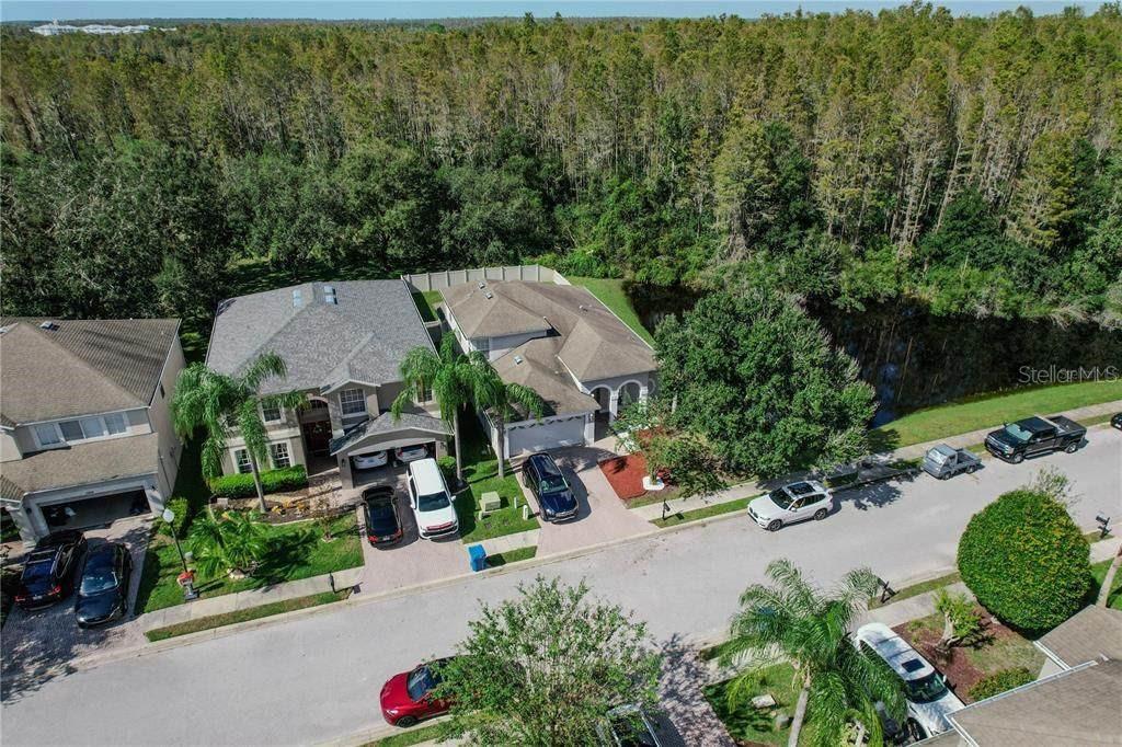 12847 Solola Way Trinity, FL 34655 - Photo 5 of 39 an aerial view of a house with garden space and street view