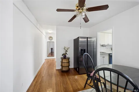 a view of a hallway with a washer and dryer