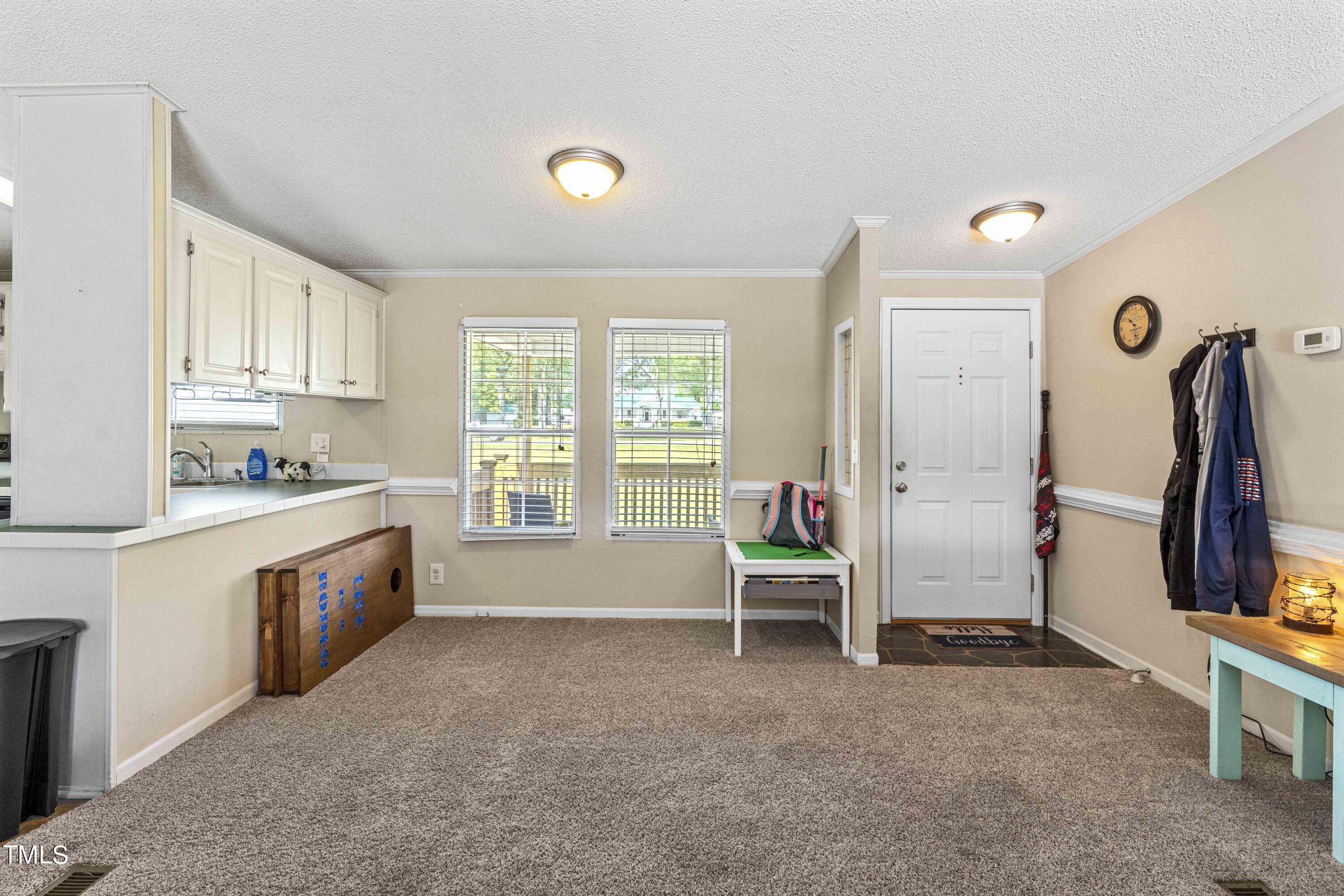5200 Brogden Road Smithfield, NC 27577 - Photo 5 of 29 5200 Brogden Foyer & Breakfast Area