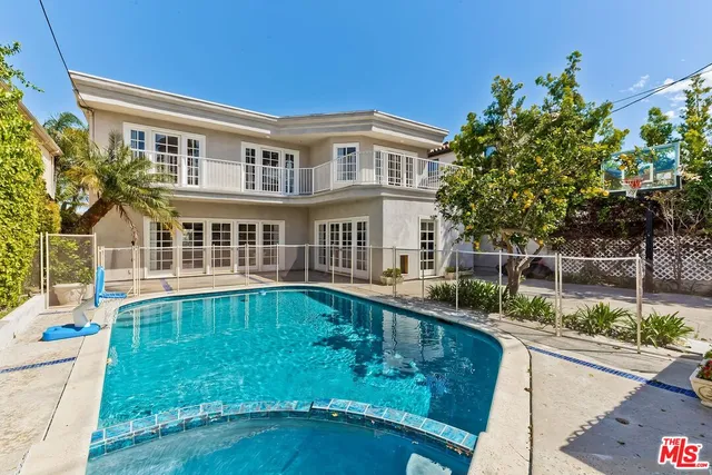 a view of a house with a swimming pool
