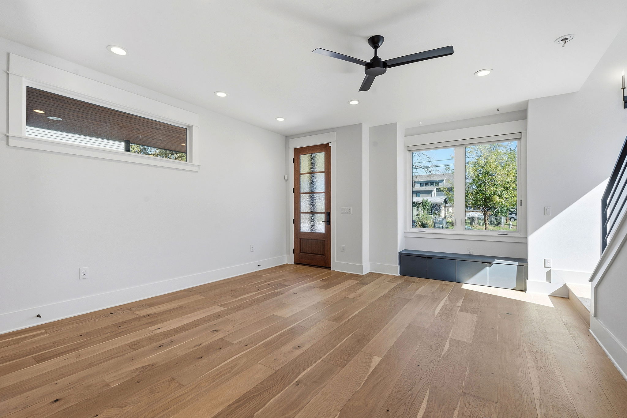 2921 Lyons Road, Unit 1 Austin, TX 78702 - Photo 2 of 20 a view of a livingroom with a ceiling fan and window