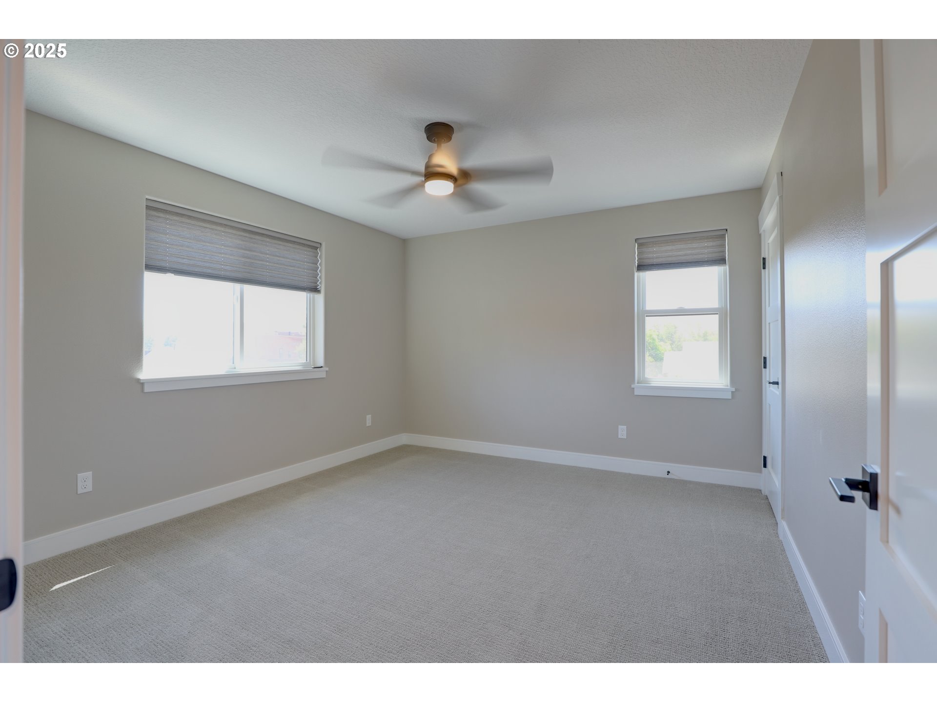 211 Heisler Street Dufur, OR 97021 - Photo 17 of 26 a view of an empty room with a window