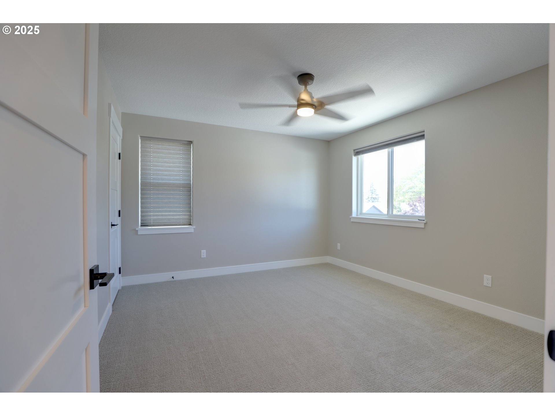 211 Heisler Street Dufur, OR 97021 - Photo 19 of 26 a view of an empty room with a window