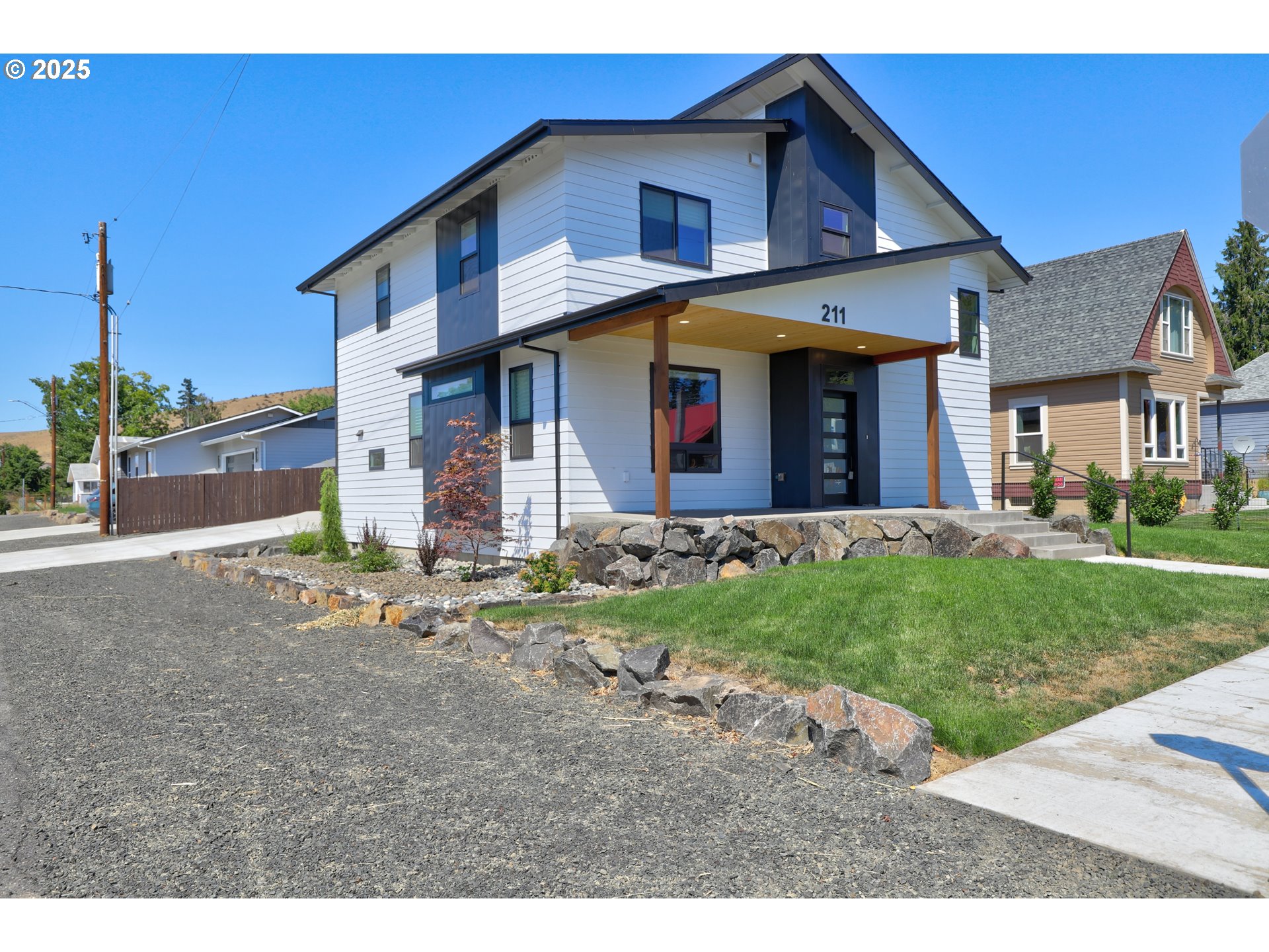 211 Heisler Street Dufur, OR 97021 - Photo 25 of 26 a view of a house with a yard