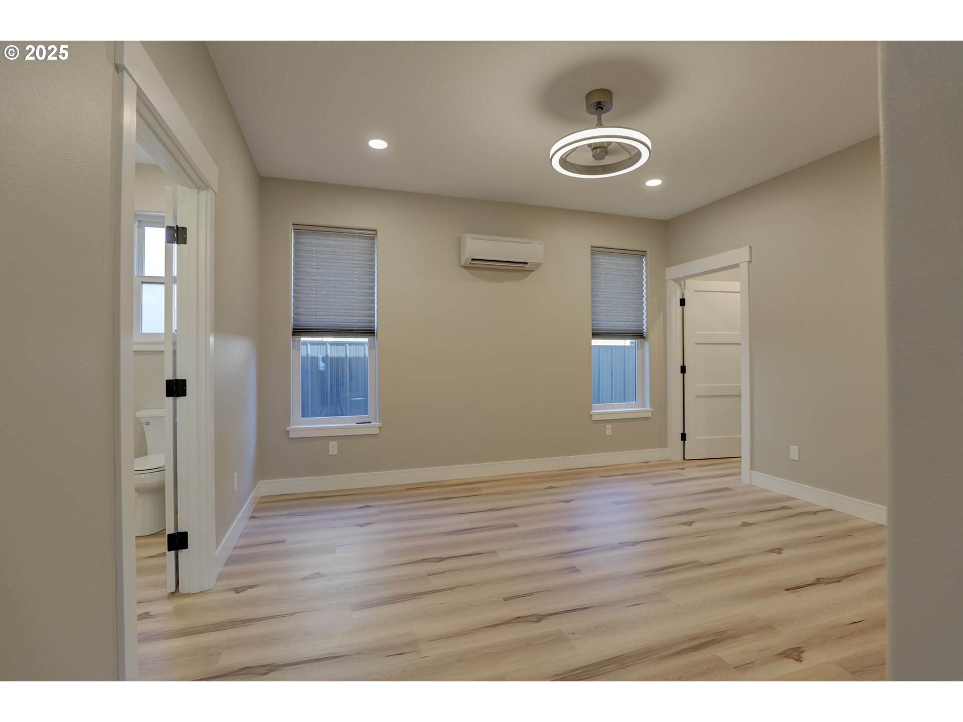 211 Heisler Street Dufur, OR 97021 - Photo 4 of 26 a view of an empty room and wooden floor