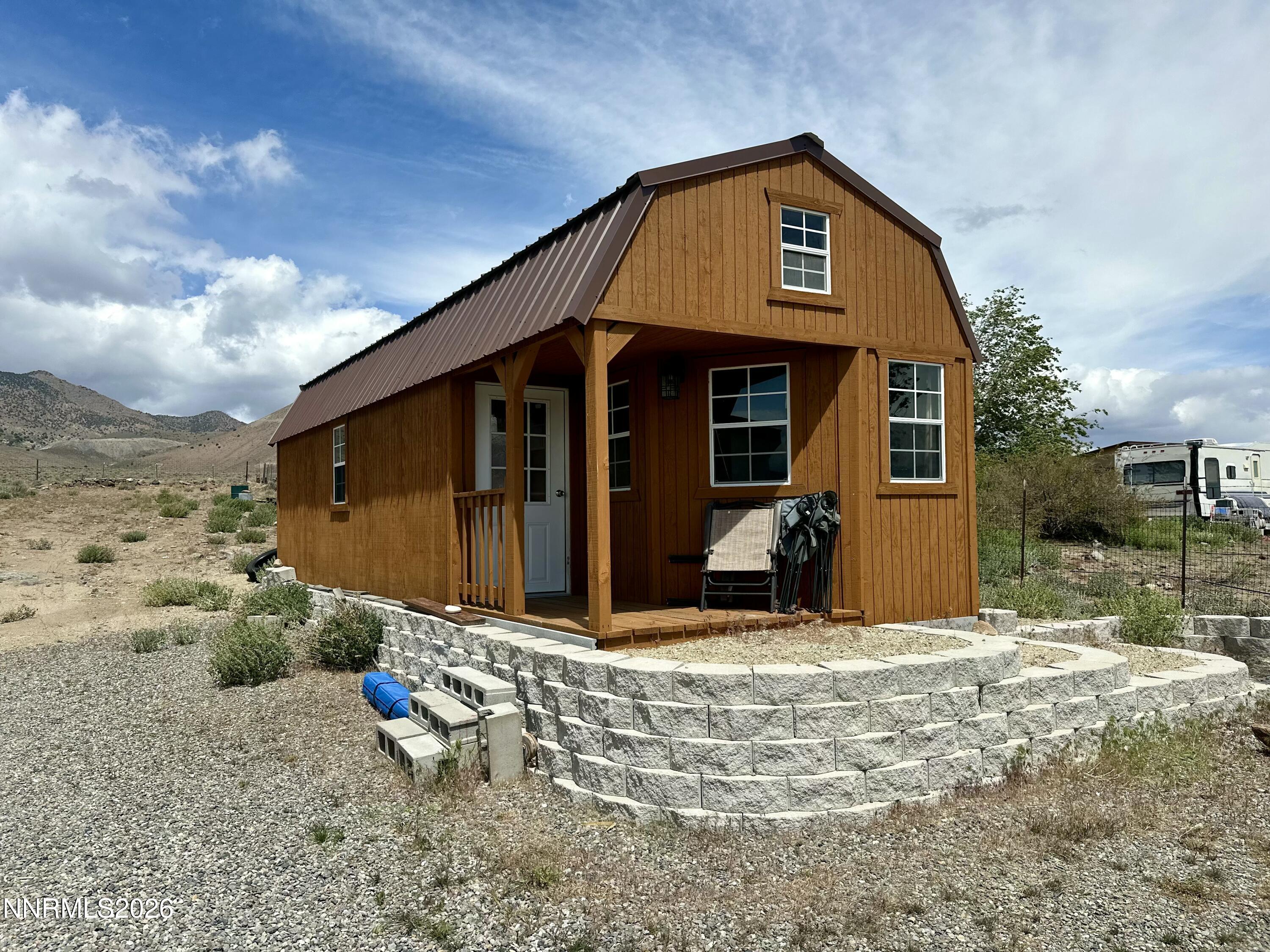 153 Territory Road Dayton, NV 89403 - Photo 5 of 23 a view of a house with a yard
