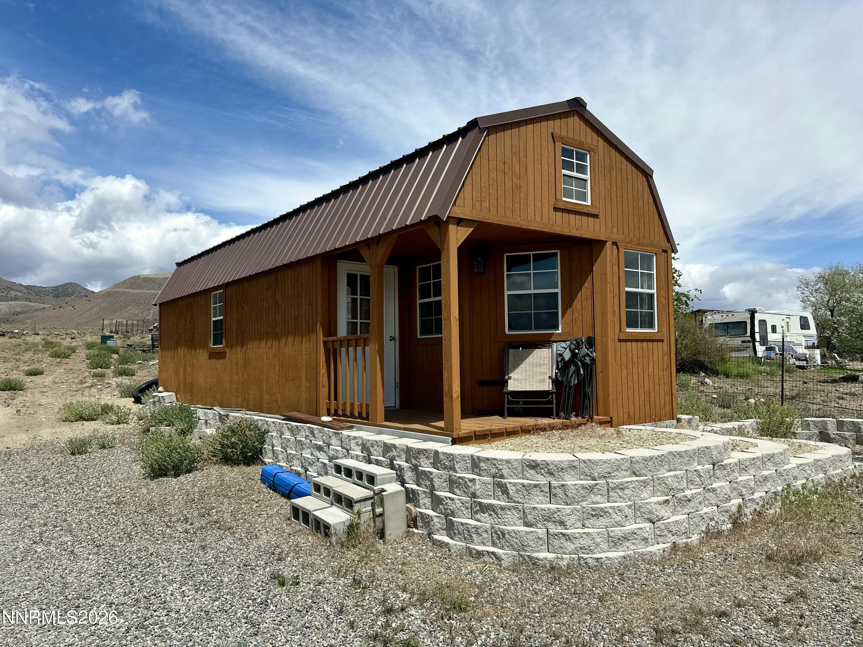 153 Territory Road Dayton, NV 89403 - Photo 6 of 23 a view of a house with a yard