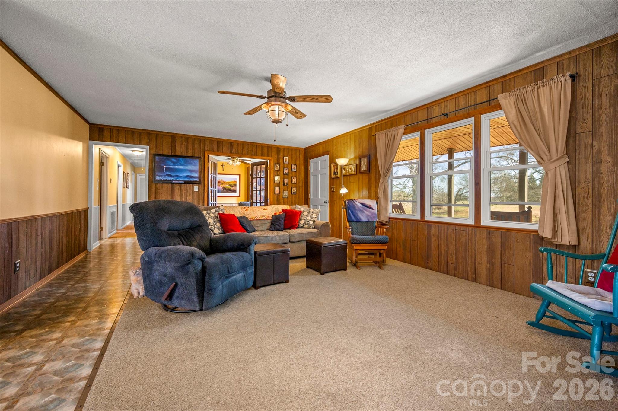 414 Sandy Run Church Road Mooresboro, NC 28114 - Photo 11 of 38 a living room with furniture and a large window